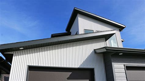 put siding on metal guest house|putting siding over metal building.